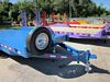 Flatbed Trailer Details: Spare mount. Adjustable self locking Coupler. 7000# dropleg jack - Eagle Trailer Company, Lawrence, Kansas