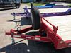 Flatbed Trailer Details: Spare tire on mount. Adjustable self locking coupler.12,000# dropleg jack. 2nd view - Eagle Trailer Company, Lawrence, Kansas