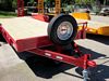 Flatbed Trailer Details: Spare tire on mount. Adjustable self locking coupler.12,000# dropleg jack - Eagle Trailer Company, Lawrence, Kansas